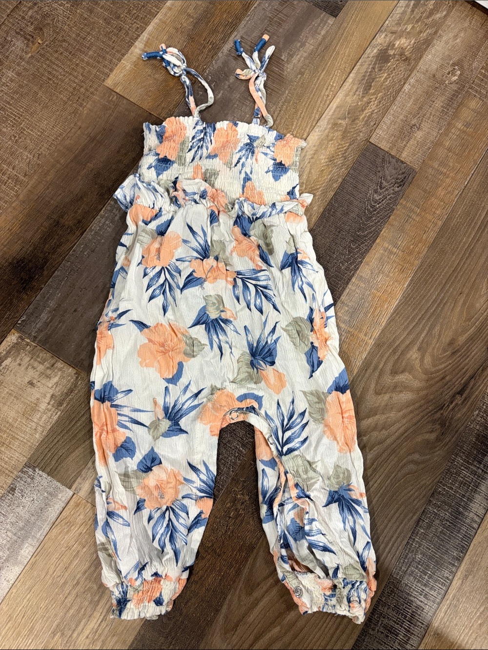 Jessica Simpson Floral Smocked Romper in Peach, Blue & Cream